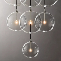 Lustre moderne en acier inoxydable avec globe en verre transparent pour salon, escalier, hôtel, décoration