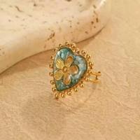 Bague ouverte ajustable tendance en acier inoxydable plaqué or 18 carats avec coquillage floral en résine, style bohème, pour femme, cadeau délicat pour elle