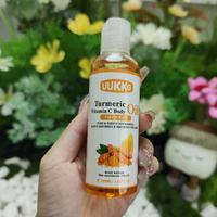 Huile de massage pour le visage et le corps à la noix de coco UUKKG 100ml, nourrit les peaux sèches, éclaircit et illumine, huile de massage OEM, vente en gros personnalisée, soin de la peau du corps
