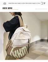 Sac d'école noir imperméable personnalisable avec logo, vente directe en gros à prix réduit