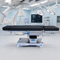 Table d'opération électrique pour gynécologie et urologie avec plaques de jambe détachables pour centre de chirurgie ambulatoire
