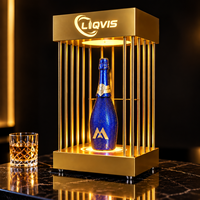 Présentoir à bouteilles en métal doré moderne LiqVis, robuste, personnalisable, éclairé par LED, pour club, fête, mariage