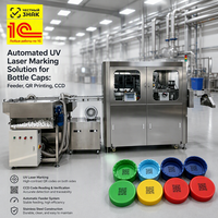 Solution de marquage laser UV automatisée pour les bouchons de bouteilles : alimentation en cascade, impression de codes QR et vérification par CCD