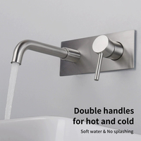 Robinet de salle de bain mural finition chromée en laiton, design contemporain, mitigeur chaud/froid à poignée unique et double commande pour lavabo