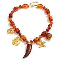Collier JINYOU 2984 en résine de couleur ambre vintage, perles irrégulières, résine ivoire, pendentif en acier inoxydable plaqué or