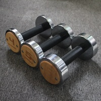Produits brevetés Équipement de fitness à domicile mode ronde chromée avec pièce de bois haltères en acier inoxydable haltères