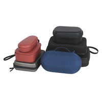 Estuche Protector de EVA OEM ODM con Ribete en Contraste Negro y Rojo, Organizador con Bolsillo Externo con Cremallera, Asa de Transporte y Correa para la Muñeca