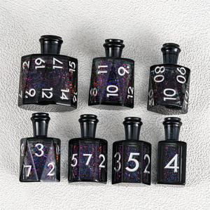 ชุดลูกเต๋า Arcane Visionary: ลูกเต๋าแกนเหลวสีดำพร้อมทรายหมุน สำหรับผู้เชี่ยวชาญด้านดันเจี้ยน - Product Image 2