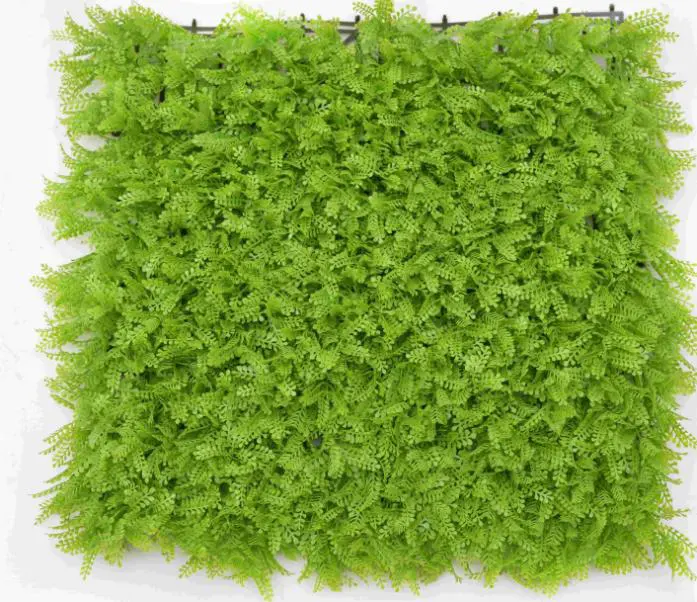 Decorazione da parete verde per interni esterni e recinzione in edera che copre Privacy pannello a parete in erba artificiale sullo sfondo di pannelli in legno di bosso verde