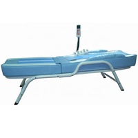 Lit de massage aux pierres chaudes réglable de luxe pour exportation Lit de massage thermique en pierre de jade de bonne qualité avec lecteur MP3
