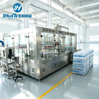 Ligne de production d'eau en bouteille multi-spécifications, machine de remplissage adaptée aux bouteilles PET de 200 ml à 2 L