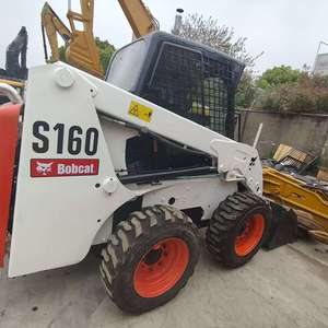 Chargeuse compacte Bobcat S160 d'origine américaine avec godet de terrassement d'une capacité de 0,33 m³ et un poids opérationnel de 2,7 tonnes, en bon état. - Product Image 5
