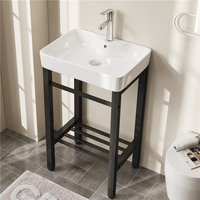 Lavabos de salle de bain simples à utiliser dans les hôtels modernes Lavabo à main en céramique avec support au sol Porte-serviettes