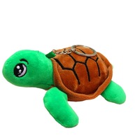 Vente en gros de jouets en peluche tortue de mer super doux et colorés, rembourrés en coton PP, accessoires de porte-clés pour sacs de femmes