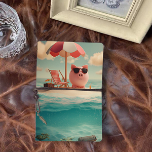 Cuaderno A6 Regalo de Pascua para que los gerentes den a los equipos como símbolos de unidad con alcancía Silla de playa Paraguas impreso en la ensenada - Product Image 1