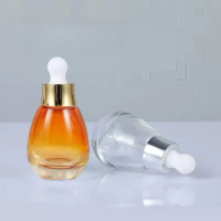 Flacons compte-gouttes en verre de 30 ml pour usine cosmétique, formes ovales ampoule, marron, noir, bleu, avec compte-gouttes dorés ou argentés pour huile capillaire et sérum