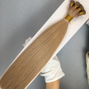 Extensiones de cabello humano Remy de una sola trama, atadas a mano, naturales y virginales de Jasmine Beauty Wholesale (color claro), cabello ruso auténtico. - Product Image 1