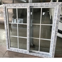 Fenêtre coulissante moderne à deux châssis en PVC/UPVC avec conception de gril Fabricant de fenêtre en PVC de taille personnalisée