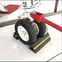 Cale de roue d'avion en caoutchouc robuste, antidérapante et résistante à l'usure, avec corde de connexion pour aéroport