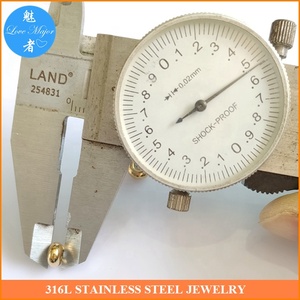 Risultati dei monili del distanziatore del tappo dell'anello di gomma dello scorrevole dell'acciaio inossidabile lucidato lucido placcato oro all'ingrosso MJJF-150 G - Product Image 4