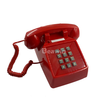 Téléphone fixe filaire de style européen des années 1930, sonnerie mécanique, cadran à boutons, design vintage à l'ancienne