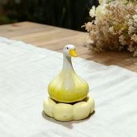 Vente en gros de toupies de bureau multi-styles en céramique, modèles miniatures en forme de poire, canard et pingouin