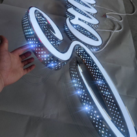 Edelstahl LED-Stanzkanal-Buchstaben Schilder 3D Außenbeleuchtete Ladenschilder Firmenlogo-Schild LED-Seitenbeleuchtete Buchstaben