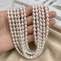 H.WEN Vente en gros de fils de perles de riz blanc 6-7mm, perles d'eau douce ovales symétriques en forme de goutte, perles en vrac pour la fabrication de bijoux