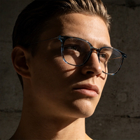 Monture de lunettes TR90 en titane moulé par injection, haute qualité, style Vogue, nouvelle collection, vente en gros, pour hommes et femmes