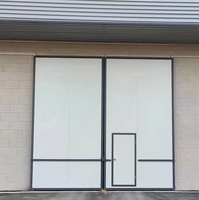 Puerta Corredera Industrial de Material Compuesto de Plástico y Acero, Moderna y Duradera, Apertura Lateral Eléctrica, Resistente al Viento, Insonorizada 60dBA, Personalizable