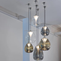 Lustre moderne en verre en forme de goutte de pluie, luminaire artistique pour plafond haut, idéal pour hôtels, restaurants, villas et projets d'éclairage intérieur