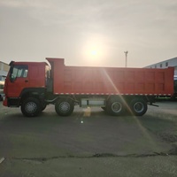 Camion benne basculante d'occasion Sinotruk Howo 40 tonnes 8X4 hydraulique diesel de haute qualité avec benne à bascule à gauche