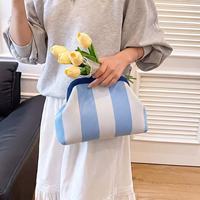 Nouveau sac à main tricoté à rayures, pochette nuage, sac de voyage portable, sacs Mahjong, grande capacité, rangement pour produits de soin, sac cosmétique type dumpling