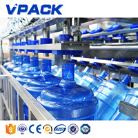 Machine de remplissage automatique complète de baril d'eau de 19L 20L 5 gallons Ligne de production d'eau de 5 gallons