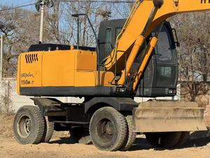 Excavatrice sur pneus Hyundai 150W-7 avec godet de terrassement d'une capacité de 0,71 m³, équipement de construction d'occasion - Product Image 3