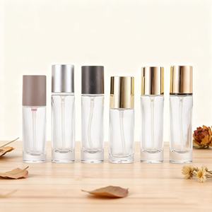 Botella de Vidrio Redonda y Gruesa de 10/15/20/30 ml para Loción/Perfume al por Mayor, con Serigrafía, Botella de Vidrio con Pulverizador/Bomba para Perfume y Crema - Product Image 1