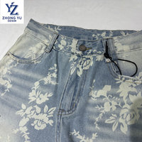 Tissu en denim imprimé de motifs de fleurs blanches personnalisées de 11.3oz tissage sergé bleu doux pour filles et garçons vêtements tissu en jean doux