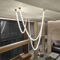 Lustres LED sur mesure d'usine, luminaires modernes en forme de collier long pour escaliers, idéaux pour salon, mariage, hôtel, grande suspension lumineuse