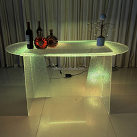 Table ovale en acrylique transparente à effet d'ondulation, design d'usine, avec éclairage RGB, pour desserts, mariages, fêtes, événements, anniversaires, décoration