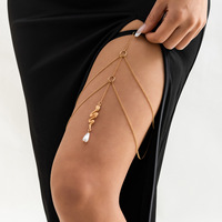 Chaîne de cuisse de serpent élastique pour les femmes, bijoux de jambe de corps de perle de double couche avec pendentif de gland pour le festival de club de partie en vente en gros