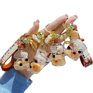Nuevo Colgante de PVC Acrílico con Luz de Osito Flotante en Té de Leche con Perlas, Llavero para Mujeres y Parejas, Colgante para Bolso, Regalo - Product Image 1