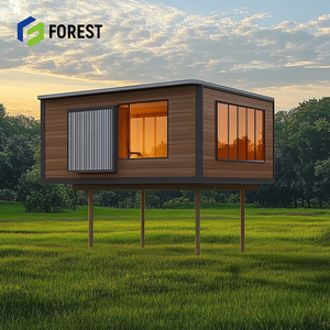 Villa en acier léger avec buanderie et buissons d'herbe, design pratique de maison préfabriquée avec un grand espace de rangement - Product Image 1