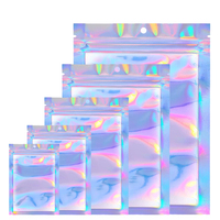 Une pochette transparente transparente pour fenêtre en plastique feuille d'aluminium refermable stockage argent holographique laser emballage sac à fermeture éclair