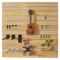 Panneau mural en MDF laminé noir pour la décoration de magasin de guitares, panneau en MDF, panneaux de fibres
