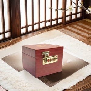 Rosewood jewelry <b>box</b> made using traditional methods, featuring gold jewelry, <b>bracelets</b>, jade beads, and agarwood packaging. - Product Image 1