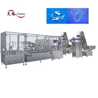 Machine de production de seringues jetables pour perfusion IV Machine d'injection de ligne de montage entièrement automatique