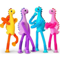 Jouet de soulagement du stress en plastique à ventouse, tube télescopique polyvalent, dinosaure de dessin animé, nouveauté