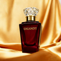 Flacon de parfum de luxe en verre rouge 50 ml avec bouchon transparent, contenant vide pour emballage de parfum haut de gamme avec boîte