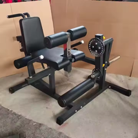 Équipement de gymnastique Machine de presse de jambe chargée de plaque d'extension et de boucle de jambe multifonctionnelle assise commerciale