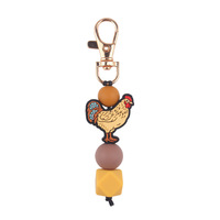 Jouet de dentition créatif DIY en forme de coq de dessin animé, fait main en silicone perlé, pendentif de sac et porte-clés, emballé individuellement pour clés de voiture et sacs